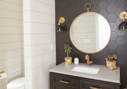 contemporary bathroom design with hexagonal floor to ceiling backsplash behind the sink