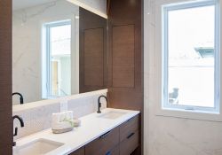 custom cabinet surrounding double vanity in a bathroom