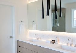 bright bathroom design with modern hanging lights
